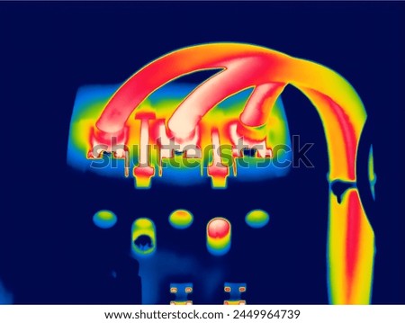 Thermal Image Close up of electrical circuit breaker with terminal shows high temperature in Oil and gas Mining Industry with Rainbow filter Lenses
