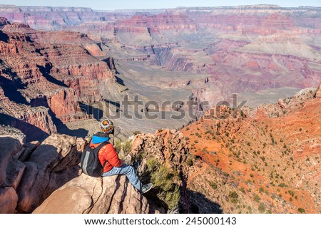Hiker man in Grand Canyon, South Rim Royalty-Free Stock Photo #245000143