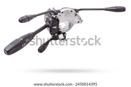 Steering wheel switches for windshield wipers and turn signals with steering angle sensor disassembled on a white isolated background, spare part for car repair or for sale at junk yard.