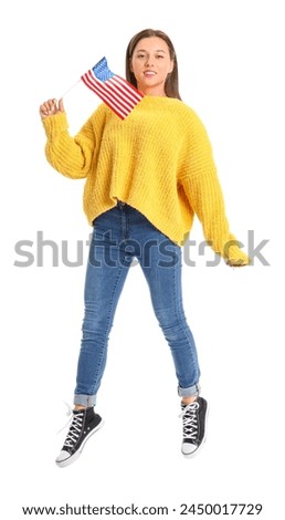 Jumping young woman with USA flag on white background