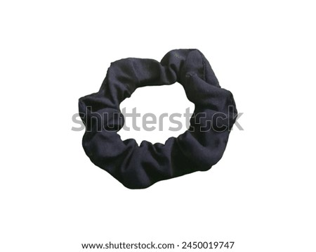 Simple nevy colored hair tie, on a white background
