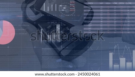Image of graphs over smartphone and payment terminal. Wireless payments, finance, trade and technology concept digitally generated image.