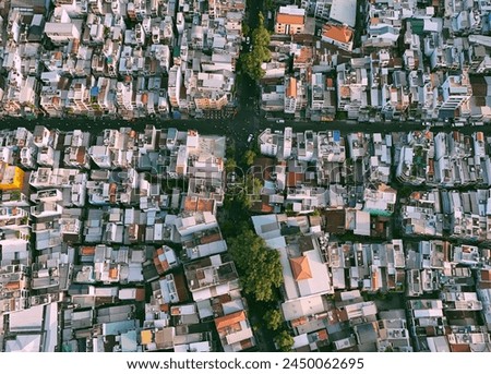 Aerial view from drone, crowde residental area at Ho chi Minh, Asia city in hot season, crowded tube house with concreted make heat radiation, overcrowded urban in change climate make hard life Royalty-Free Stock Photo #2450062695