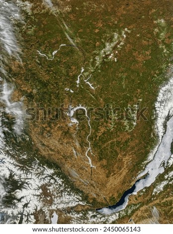 Burning Fields near the Angara River. With ice still on the Angara River, farmers in Russia began preparing their fields for the coming growing. Elements of this image furnished by NASA.