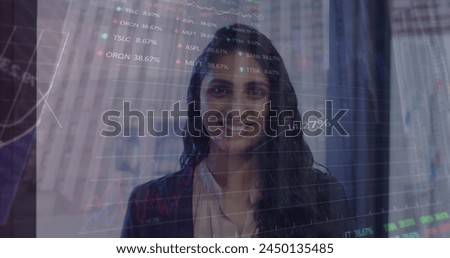 Stock market processing over portrait of indian woman smiling at office. Business data and analytics technology concept
