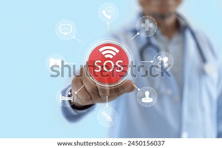 Innovative healthcare medical doctor holding SOS alert hologram healthcare icons, emergency services advanced medical assistance, modern telemedicine, urgent care, healthcare services, medical apps Royalty-Free Stock Photo #2450156037