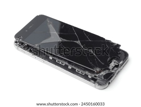 Crushed smartphone with broken screen isolated on white
