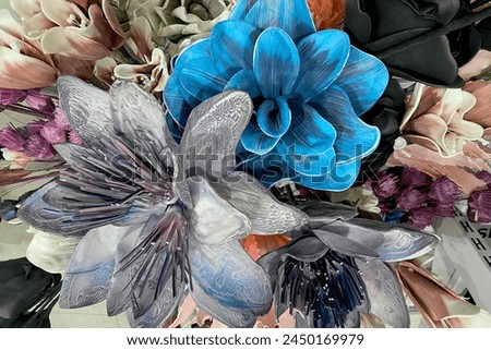 Decorative artificial grey flower made of fabric. Grey blue exotic plant with large petals. Template business cards, phone case, covers, packaging, interior decoration. Vintage floral card.