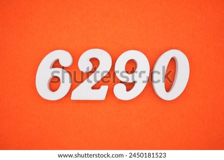 Orange felt is the background. The numbers 6290 are made from white painted wood.