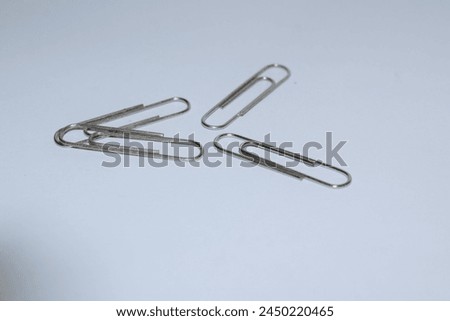 Gam paper clip on white background
