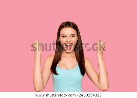 Close up studio photo portrait of cheerful nice beautiful glamorous she her youngster millennial make hold fists looking at camera isolated bright vibrant vivid background Royalty-Free Stock Photo #2450234325