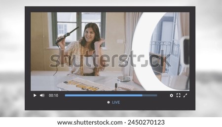 Image of social media screen over caucasian woman making image blog at home. Social media and digital interface concept digitally generated image.