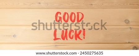 Good luck symbol. Concept words Good luck on beautiful wooden wall. Beautiful wooden wall background. Business, motivational good luck concept. Copy space.