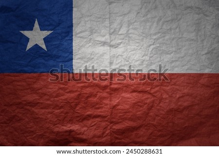 colorful big national flag of chile on a grunge old paper texture background