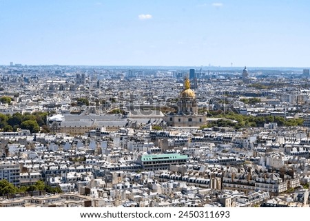 Aerial panoramic view of the city of Paris, France. Hotel dels Invàlids, Arc de Triomf de l'Étoile, Musée de l'Armée, Tour Eiffel - Parc du Champ-de-Mars. Royalty-Free Stock Photo #2450311693