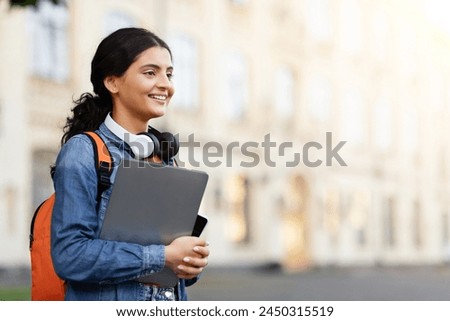 This inviting image of an Indian lady with headphones and laptop, blending education and technology in a campus atmosphere for a zoomer