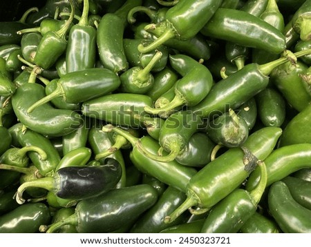 green ripe jalapeños hot peppers