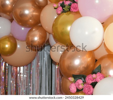 rose gold pink balloons and pink flowers backdrop for pictures