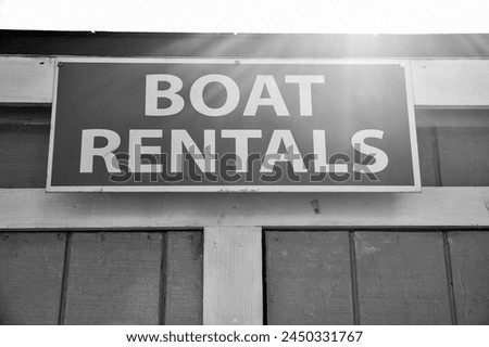 Boat Rental sign on the red lakeside hut