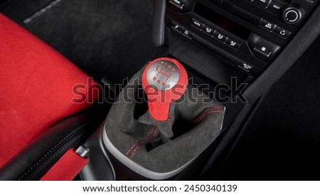 6 speed shift knob inside a car Royalty-Free Stock Photo #2450340139