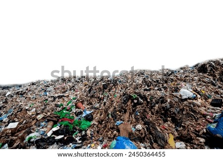 Big pile of trash on a white background Mountains of plastic waste, old rags, and scraps are thrown away on roadsides and public places. Household waste that is difficult to decompose causes pollution Royalty-Free Stock Photo #2450364455