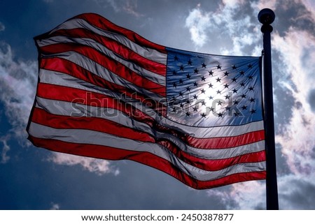 American election and vote concept. US Flag. Waving american flag on dark dramatic sky. Grunge American flag. US flag and sunrise. Independence day.