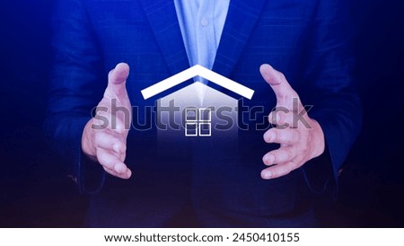 Real estate concept, Businessman holding home icon, Property insurance and security concept, Protecting gesture and symbol house. Real estate agent providing home.