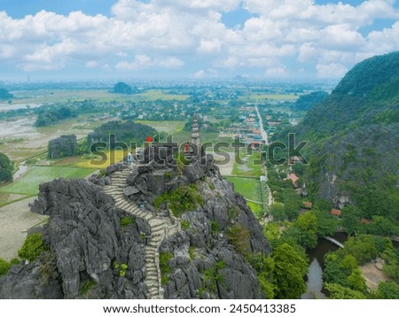 Stairway at limestone mountain to Hang Mua view point. Popular tourist attraction at Tam Coc, Ninh Binh. Vietnam travel landscapes and destinations