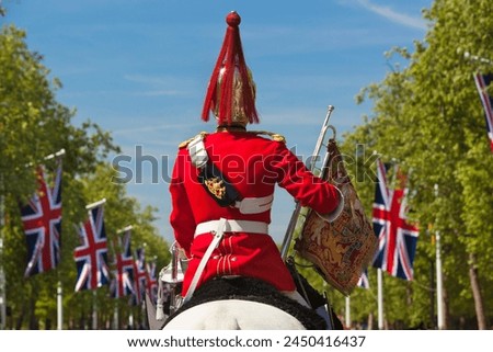 Mounted soldier of the Household Cavalry along The Mall, London, England, United Kingdom, Europe Royalty-Free Stock Photo #2450416437