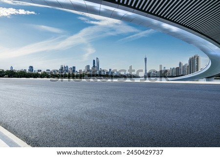 Asphalt road and bridge with modern city buildings scenery in Guangzhou