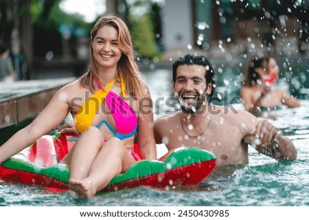 Summer Pool Party Fun: Friends in Swimwear Enjoying Happy Moments Together, A Group of Young Women and Men Creating Joyful Memories of Friendship and Laughter by the Water