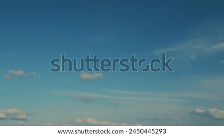 Tropical Summer Or Spring Sunlight With Clouds On Different Layers. Two Layers Of Cloudiness. Royalty-Free Stock Photo #2450445293