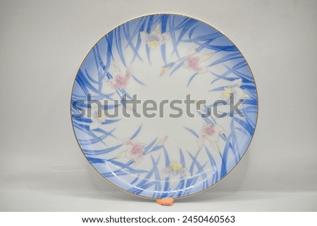 vintage porcelain plate with floral pattern