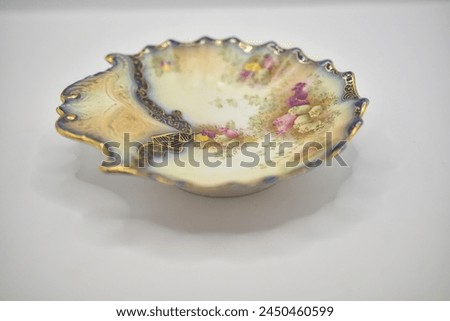 vintage porcelain plate with floral pattern