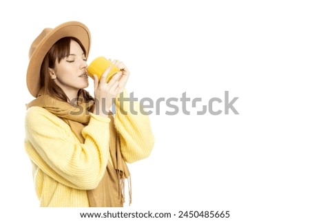 PNG, a girl in a hat and a scarf with a cup in her hands, isolated on a white background