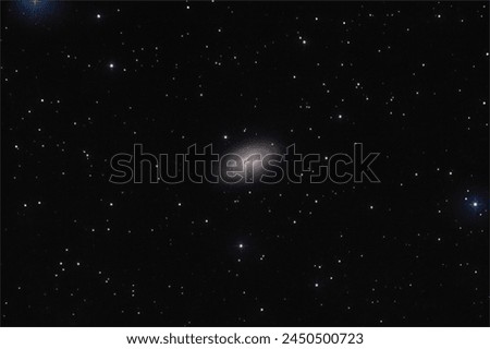 Ultra deep sky photo of the The Black Eye Galaxy in the mildly northern constellation of Coma Berenices taken with an extreme long exposure.