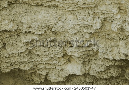 Rocks with the release of yellow sulfur, volcanic activity, zone of geothermal activity in the Rotorua region North Island of New Zealand Royalty-Free Stock Photo #2450501947