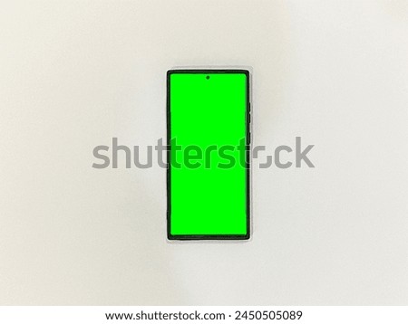 Mobile Phone with Green Screen and Chroma Key isolated on white background. New Mobile Phone Clear Mockup.
