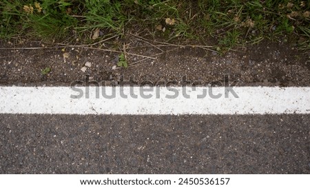 Empty highway black asphalt road and white dividing lines, Top view Royalty-Free Stock Photo #2450536157