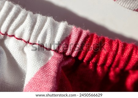 Gathered elastic fabric isolated on white background.