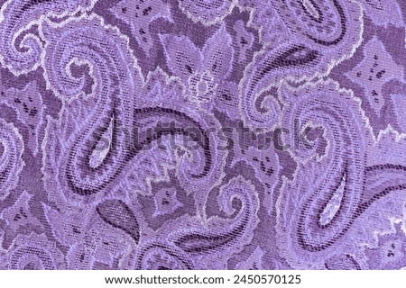 texture of abstract lilac fabric. textiles with Indian motifs