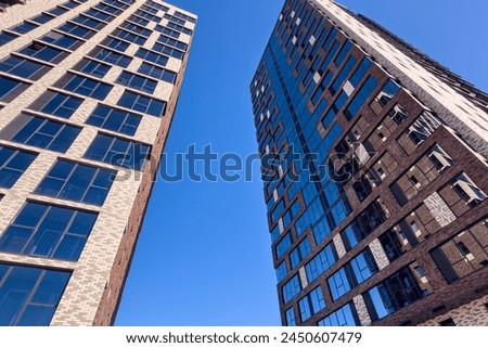 New multistory premium apartment building in Russian city Royalty-Free Stock Photo #2450607479