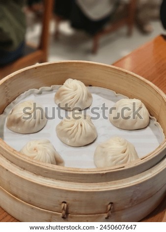 my top rated steamed bun xiaolongbao in HK, served in a michelin recommended restaurant in Tsim Sha Tsui Royalty-Free Stock Photo #2450607647