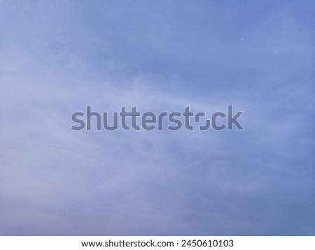 Mild cloud formation visible in the dusk and dramatic evening sky