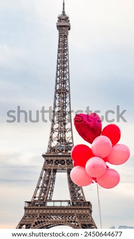 pink and red balloons in front of Eiffel tower, Paris, city of love