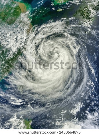 Tropical Storm Haikui 12W approaching China. Tropical Storm Haikui 12W approaching China. Elements of this image furnished by NASA. Royalty-Free Stock Photo #2450664895