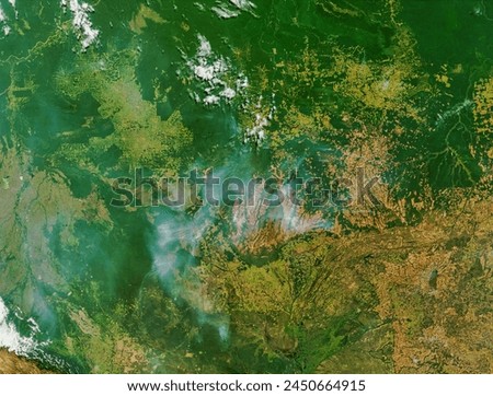 Fires and smoke across Mato Grosso, Brazil. Fires and smoke across Mato Grosso, Brazil. Elements of this image furnished by NASA.