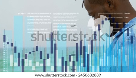 Image of graphs and diverse data over african american man using smartphone. global communication, connections, finance, technology and concept digitally generated image.
