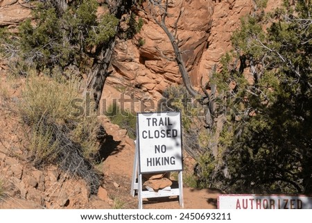 Trail closed. No hiking. Signs at Navajo National Monument in Navajo Nation territory, Arizona. Preserves three well-preserved cliff dwellings of Ancestral Puebloan people. Authorized personnel only.