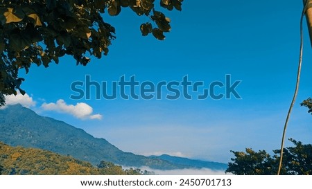 View on top of Pamoyanan Hill, beautiful sunrise view when climbing Pamoyanan Hill, Indonesia  Royalty-Free Stock Photo #2450701713
